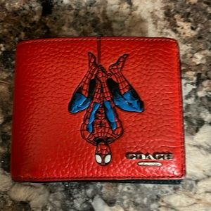 Like new. Limited edition spiderman coach wallet with insert.